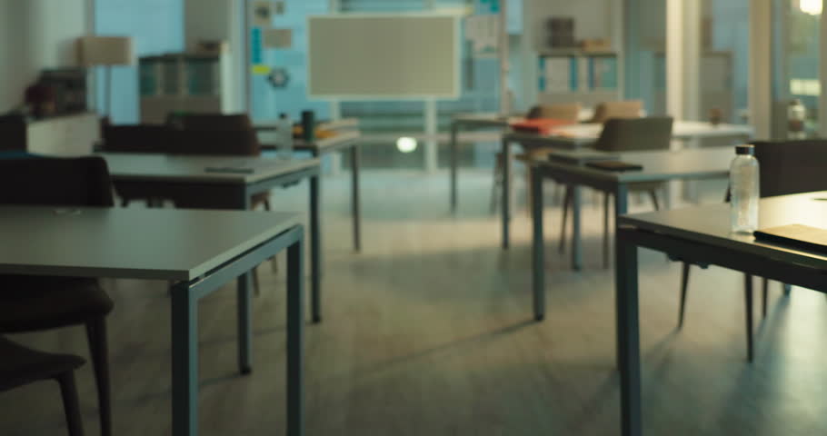 Education, furniture and interior with empty classroom on college campus for learning or study. Development, space and university with desks in school for after hours knowledge or scholarship