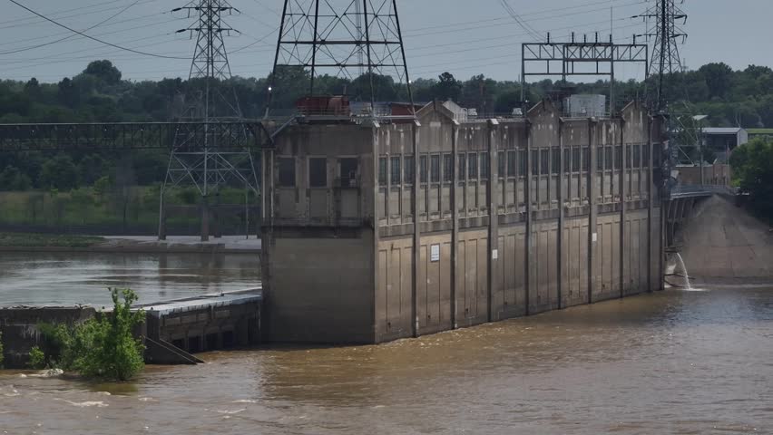 Flood control and management of water levels after extreme rainfall on Ohio River at Louisville, Kentucky McAlpine Locks and hydroelectric dam