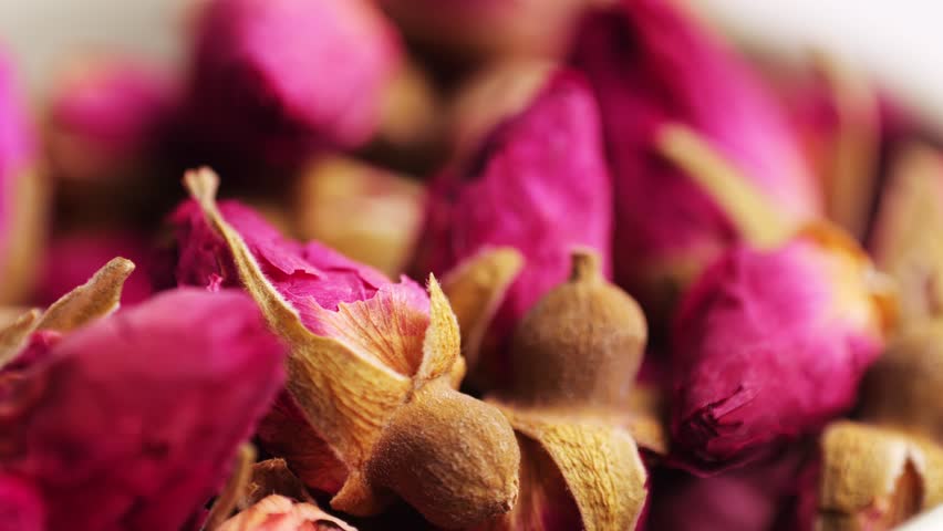 Dried rose bud tea texture background, Healthy herbal tea macro texture close up. 