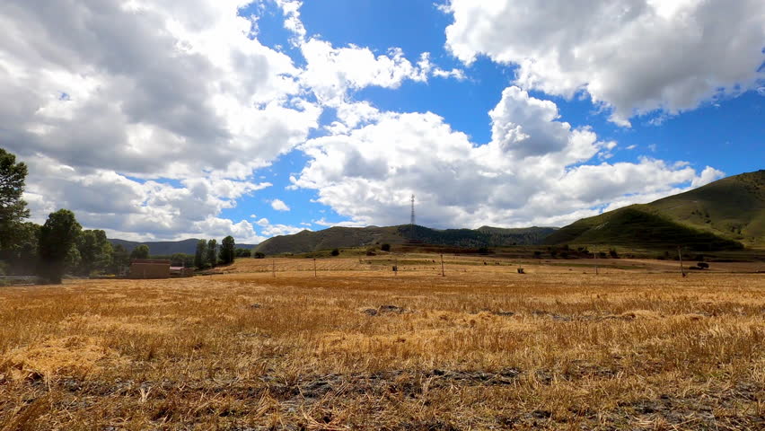 Grand Autumn Grassland Blue Sky Clouds Time Lapse West Sichuan 4K