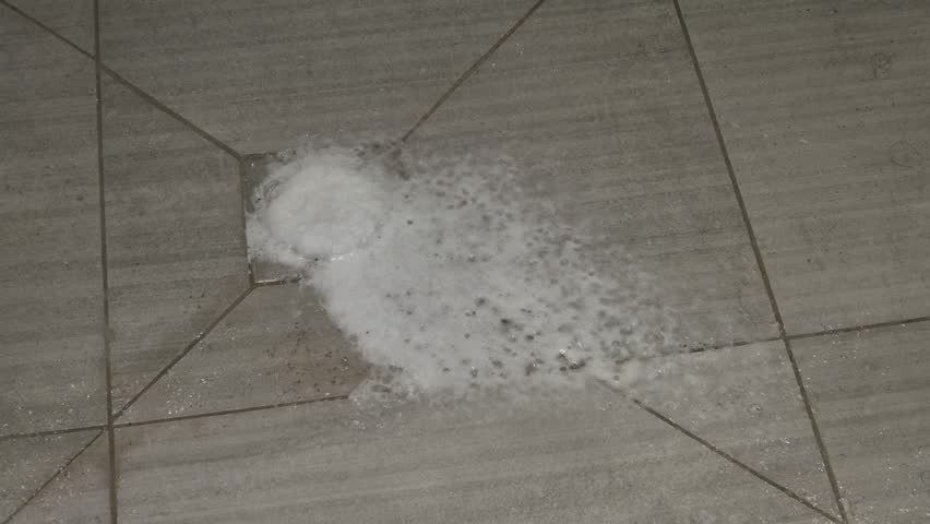Foam on the shower drain.
