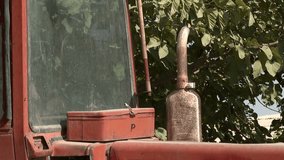 Weathered, rusty farm tractors parked in rural settings, showcasing their age and past utility. Ideal for agricultural history, vintage machinery, and countryside themes. - Powered by Shutterstock - Get 15% off with code: PIKWIZARD15