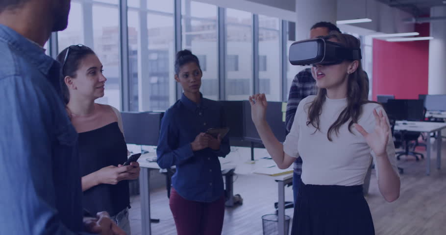 Woman with VR headset stepping in office, gesturing while binary overlay growing for tech demo. Technology, innovation, teamwork, digital, collaboration, futuristic, modern