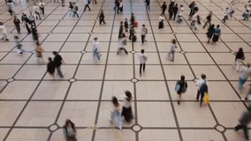 Timelapse of crowd of people walking on a tiled floor in Japan. - Powered by Shutterstock - Get 15% off with code: PIKWIZARD15