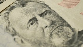 Multiple 50 dollar bills stacked on each other. Portrait of Ulysses Grant visible on top bill. Official currency issued by government for economic transactions and financial operations  - Powered by Shutterstock - Get 15% off with code: PIKWIZARD15