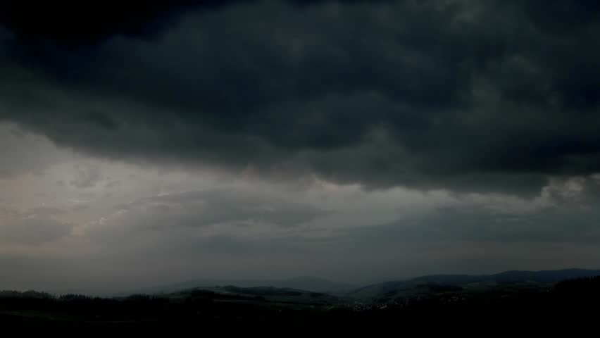 Storm Clouds Time Lapse Super cell  Dark Swirling Thunderstorm Sky with Fast Moving Clouds, Lightning Strikes, Rain Drops, and Hurricane Energy Visual Background