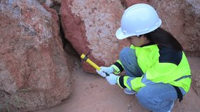 Geologist surveying mine,Explorers collect soil samples to look for minerals. - Powered by Shutterstock - Get 15% off with code: PIKWIZARD15