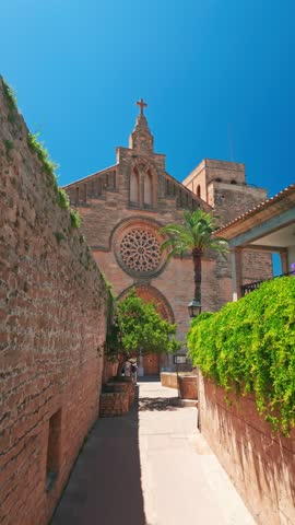 Beautiful church of St Jaume in the picturesque town of Alcudia, Mallorca. A prominent landmark in Balearic Islands, Spain, showcasing historic architecture and cultural heritage of Majorca island.