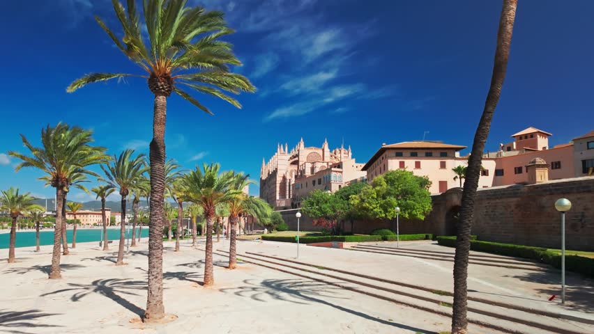 The Cathedral of Santa Maria of Palm, Palma de Mallorca, Mallorca, Balearic Islands, Spain. Steadicam revealing footage of the historic Cathedral building on Majorca island at sunny day. 