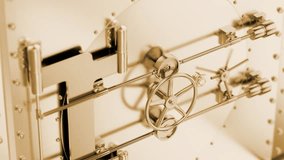 Sophisticated golden vault door revealing precise mechanical movements. Highlighting intricate locking mechanism. Emphasizing security and confidential financial protection with metallic golden tones - Powered by Shutterstock - Get 15% off with code: PIKWIZARD15