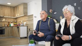 Seniors embrace gaming joyfully in a modern living room setup - Powered by Shutterstock - Get 15% off with code: PIKWIZARD15