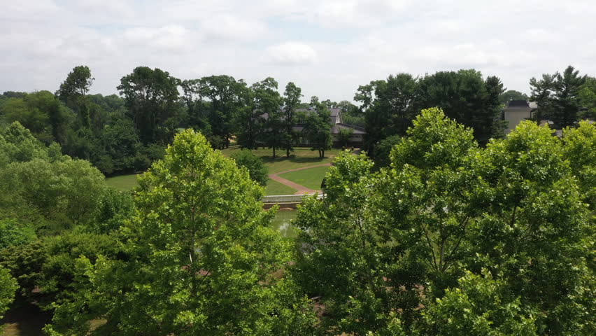 Wedding Venue Pond With A Fountain And A Gazebo Over The Water - The Ashford Estate In New Jersey, USA. - aerial shot