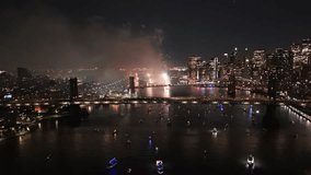 Fireworks illuminate night sky over East River in New York for 4th of July event - Powered by Shutterstock - Get 15% off with code: PIKWIZARD15