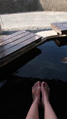 Japanese traditional foot hot bath in the street , foot onsen in Shirahama, Japan, popular tourist attraction in asia