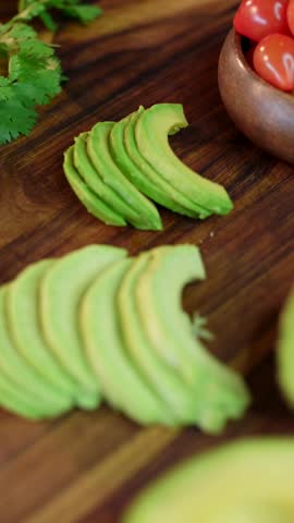 Close-Up of Slices of Avocado on a Cutting Board – 4K Ultra HD Fresh Food Prep, Healthy Eating, and Minimal Kitchen Aesthetic