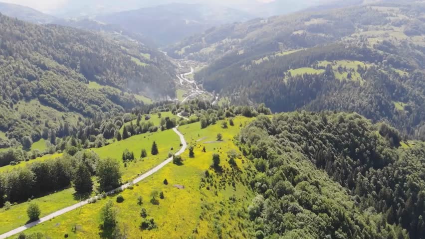 Cinematic Aerial Footage of Scenic Sunsets Over Mountains, Valleys, and Reservoirs – Porcupine Mountains, Crystal Cascades Valley, and Mount Bold Dam Captured in Golden Light and Natural Beauty.