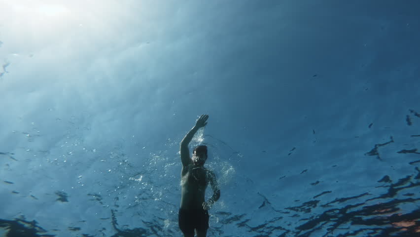 swimming in the sea in freestyle