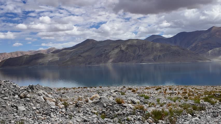 Pov of Leh Ladakh by road, landscapes of rugged mountains, high altitude deserts and serene lakes