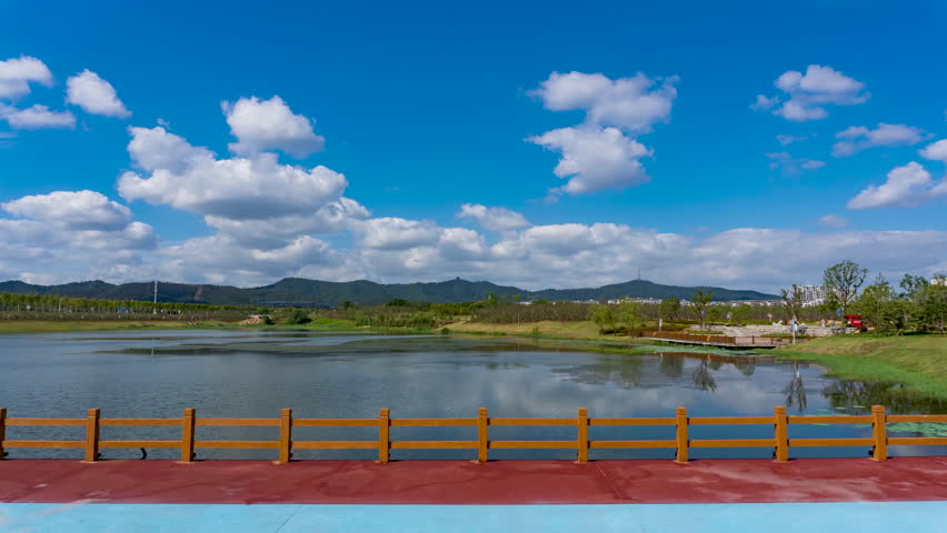 Summer Park Lake with Blue Sky Cloud Movement Time Lapse 4K