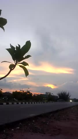 the sunset on the street with the beutiful view