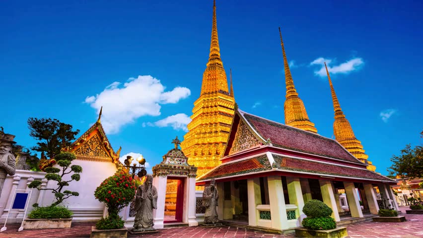 Royal grand palace golden temple in Bangkok, Thailand Temple of the emerald buddha golden pagoda with blue sky cloud, Thailand travel bcakground