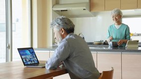 Senior man watching video streaming service on laptop - Powered by Shutterstock - Get 15% off with code: PIKWIZARD15