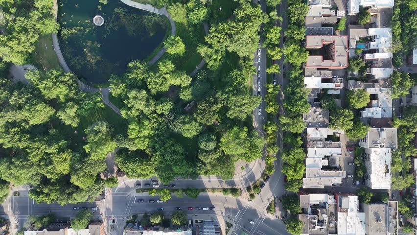 Drone flight above the La Fontaine park in summer, downtown in the background. Montreal, Quebec, Canada...