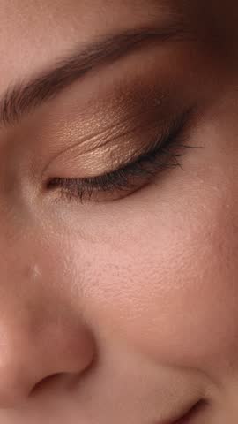Close-up of a woman s face highlighting her green eye, flawless skin, and natural beauty. Perfect for skincare ads, beauty products, and wellness promotions emphasizing radiant and healthy skin. 