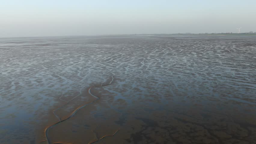 Drone Footage of North Sea Mudflats during Ebb Tide