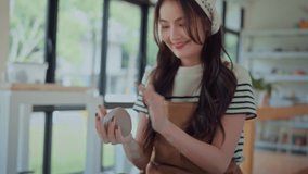 Happy woman artisan shaping clay with hands on pottery wheel in boutique ceramic workshop – creative sculpting and handmade pottery production for small startup business and artistic retail market - Powered by Shutterstock - Get 15% off with code: PIKWIZARD15