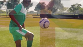 Soccer player flicking ball off turf, juggling with feet and chest, demonstrating football training. Athlete, sport, agility, outdoor, technique, fitness, competition - Powered by Shutterstock - Get 15% off with code: PIKWIZARD15