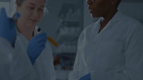 Two female scientists holding test tube forming network nodes and lines visualizing research data. Scientists, collaboration, innovation, digital, technology, analytical, scientific - Powered by Shutterstock - Get 15% off with code: PIKWIZARD15