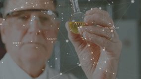 Senior scientist lifting flask upward, removing stopper, inspecting yellow liquid clarity in lab. Scientist, laboratory, research, chemistry, innovation, analytical, scientific - Powered by Shutterstock - Get 15% off with code: PIKWIZARD15