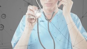 Doctor placing stethoscope on ears and activating data graphs while speaking into phone for exam. Medical, technology, healthcare, communication, digital, innovation, diagnostic - Powered by Shutterstock - Get 15% off with code: PIKWIZARD15