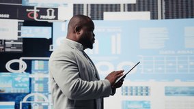 African american businessman contemplating about new powerful ideas to obtain funds, data insights for the financial and KPI projections decision making. Forecasting for productivity. Camera A. - Powered by Shutterstock - Get 15% off with code: PIKWIZARD15