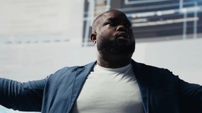 Black engineer explores algorithm design and binary code with high tech AI tools, programming code for automation and innovation. Connection to IT systems and the futuristic world. Camera B. - Powered by Shutterstock - Get 15% off with code: PIKWIZARD15