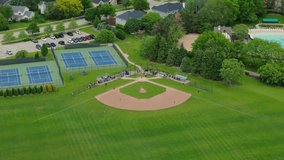 Baseball Players Playing During Match On A Sunny Day. Aerial shot footage - Powered by Shutterstock - Get 15% off with code: PIKWIZARD15