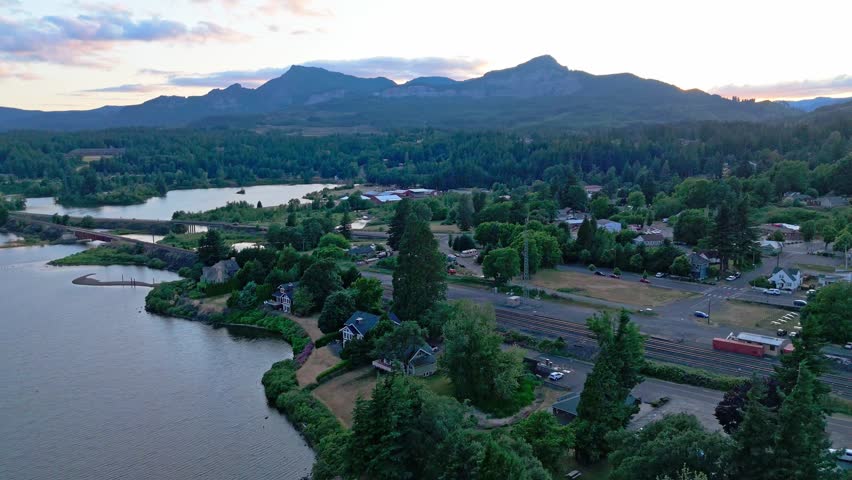Aerial shot of Stevenson, Washington at sunset, with views of Columbia River, Table Mountain and Lewis and Clark Highway