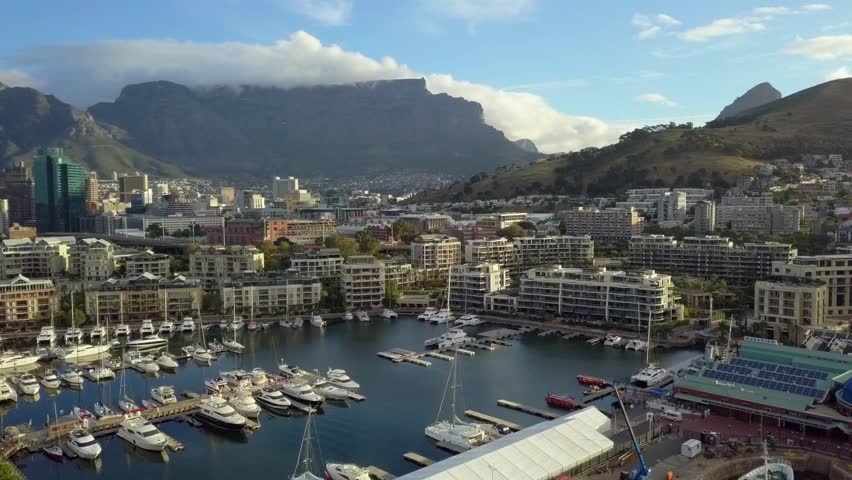 Aerial shot of Waterfront precinct of Cape Town, against the backdrop of Table Mountain, Cape Town, South Africa.