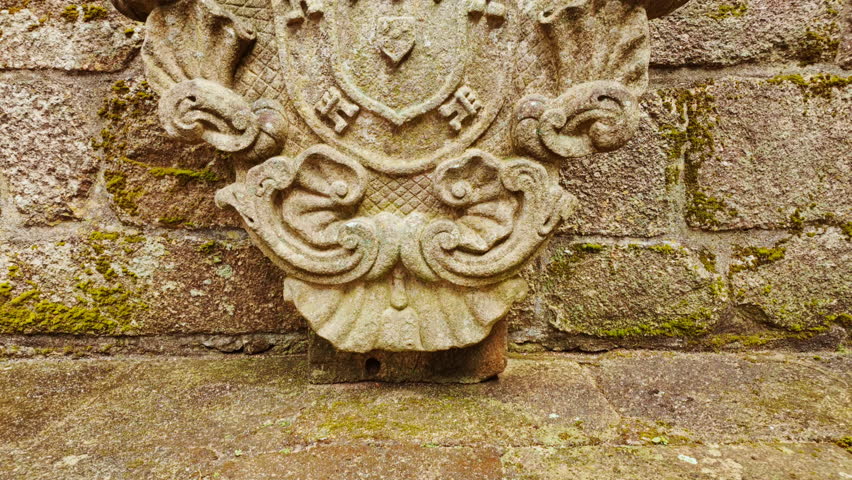 Echoes of noble life linger among roofless halls and sculpted corbels at The Ruins of the Paco dos Condes de Barcelos Palace in Guimaraes, Portugal
