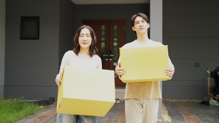 Togetherness defines their cheerful relocation, with love guiding every step.
