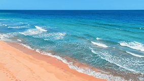 Blue wave view on tropical paradise beach of Pacific ocean. Sea waves on golden sand. Clear sunny day over green sea waters. Waves crashing on sandy beach. Changeable windy weather. - Powered by Shutterstock - Get 15% off with code: PIKWIZARD15