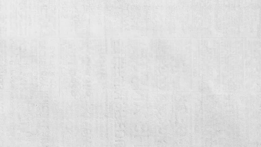 Grunge Paper Texture Loop. A distressed, black and white animation of flickering old documents and text.
