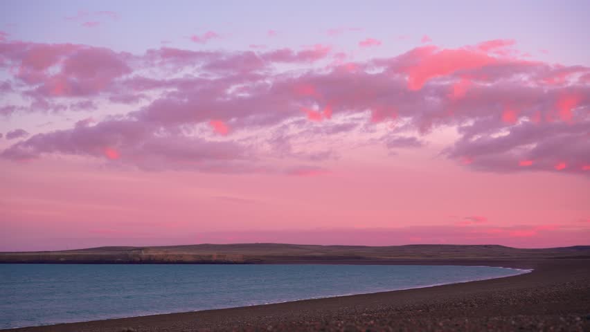 Time-lapse of Clouds Drifting Over Remote Argentine Atlantic Coast in Patagonia with Sunset Pastel Colors