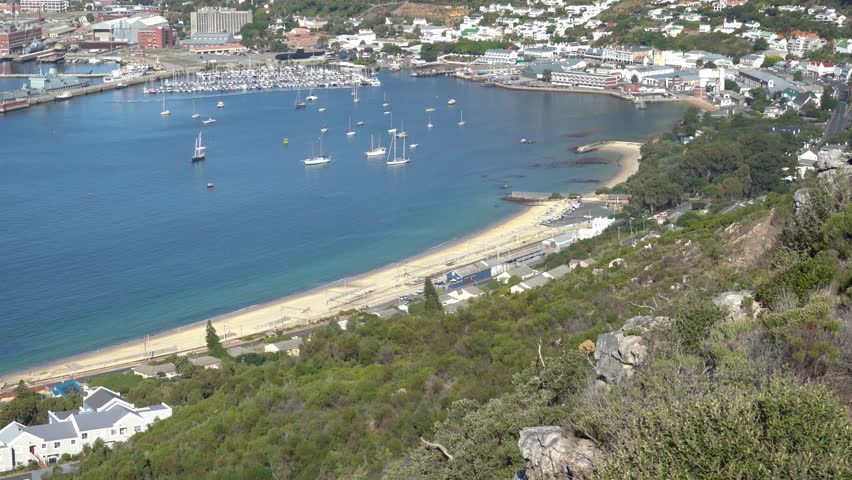 Simons Town Beach with views of the navy harbour and the marina