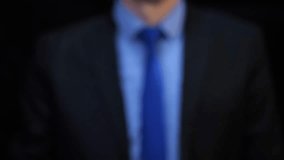 Businessman with magnifier reveals gears and question marks. Brainstorming and problem solving process - Powered by Shutterstock - Get 15% off with code: PIKWIZARD15