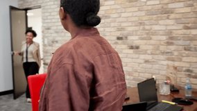 Mother hugs teacher upon entering, then is invited to sit across the desk - Powered by Shutterstock - Get 15% off with code: PIKWIZARD15