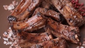 Meat, beef ribs in a marinade grilled with salt and spices. Grilled ribs, barbecued meat food - Powered by Shutterstock - Get 15% off with code: PIKWIZARD15