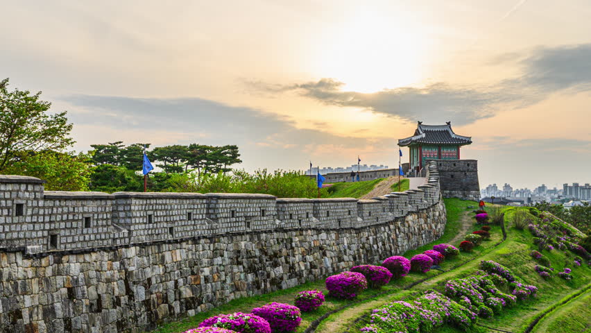 4K Timelapse Video (Zoom Out) Sunset at Hwaseong Fortress, a UNESCO World Heritage Site. Hwaseong Fortress in Spring, Suwon, South Korea.