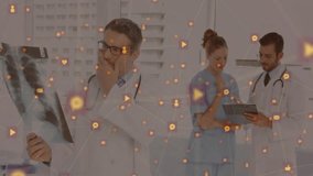 Doctor examining X-ray causing icons drifting while nurse and peer tapping tablet for diagnosis. Medical, collaboration, innovation, technology, healthcare, professional, diagnostics - Powered by Shutterstock - Get 15% off with code: PIKWIZARD15